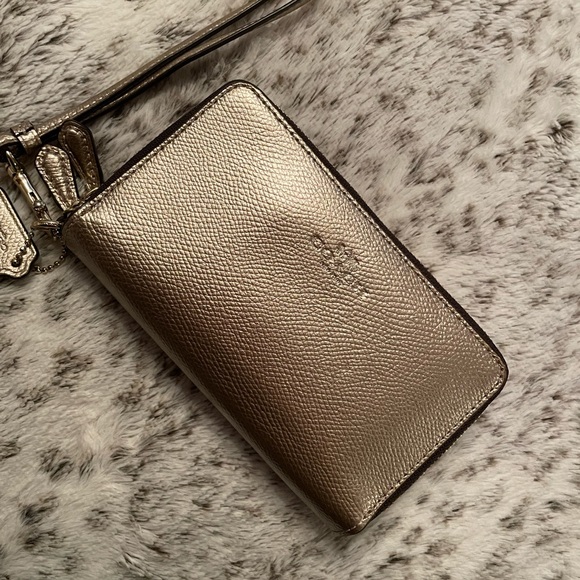 Coach Handbags - Coach gold wristlet wallet